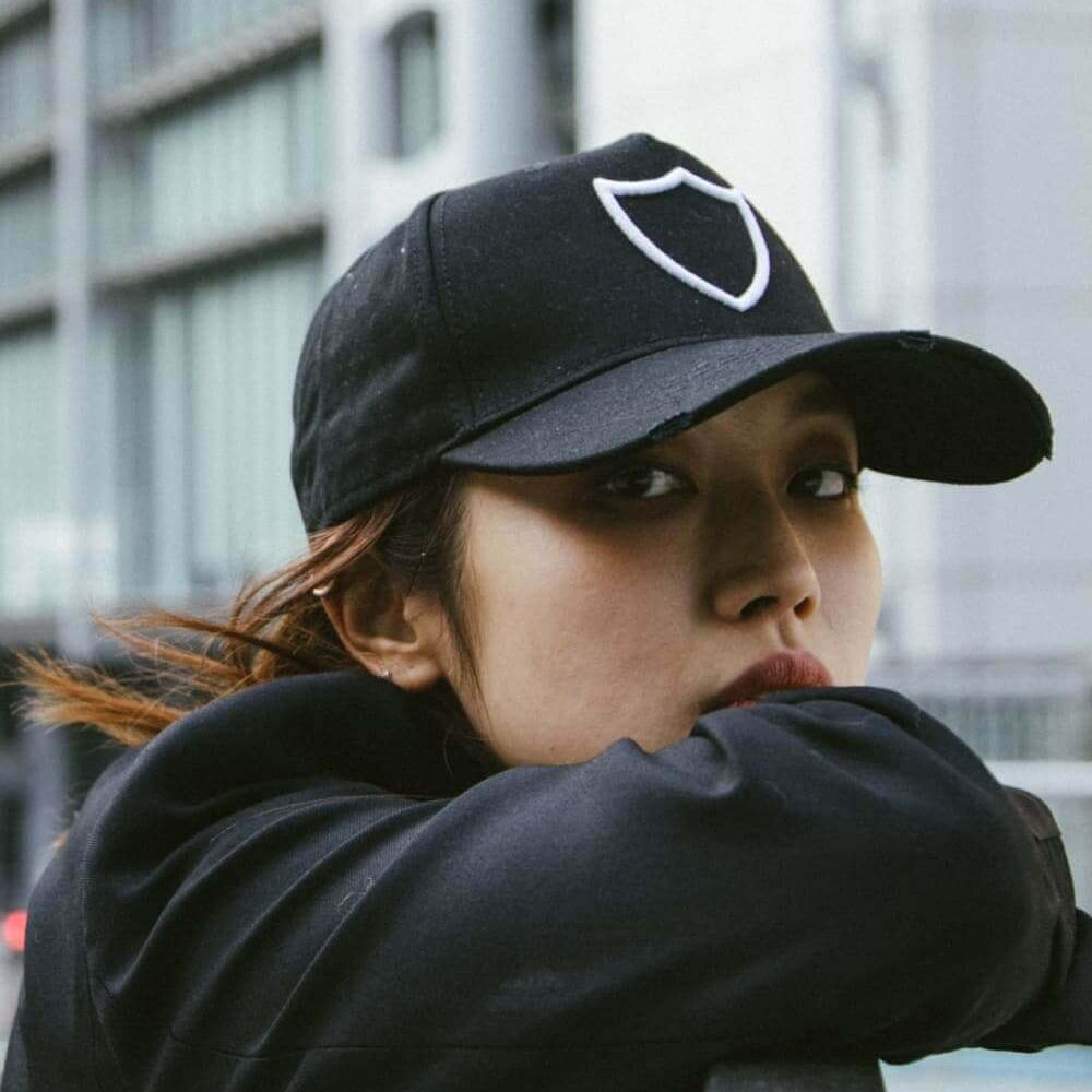 Hollywood Trading Company HTC LOGO BASEBALL CAP HTC LOGO BASEBALL CAP Black baseball cap with preformed peak, round crown with eyelets, HTC Los Angeles shield logo embroidered on the front, adjustable strap on the back. One size fits all. 100% cotton. cap