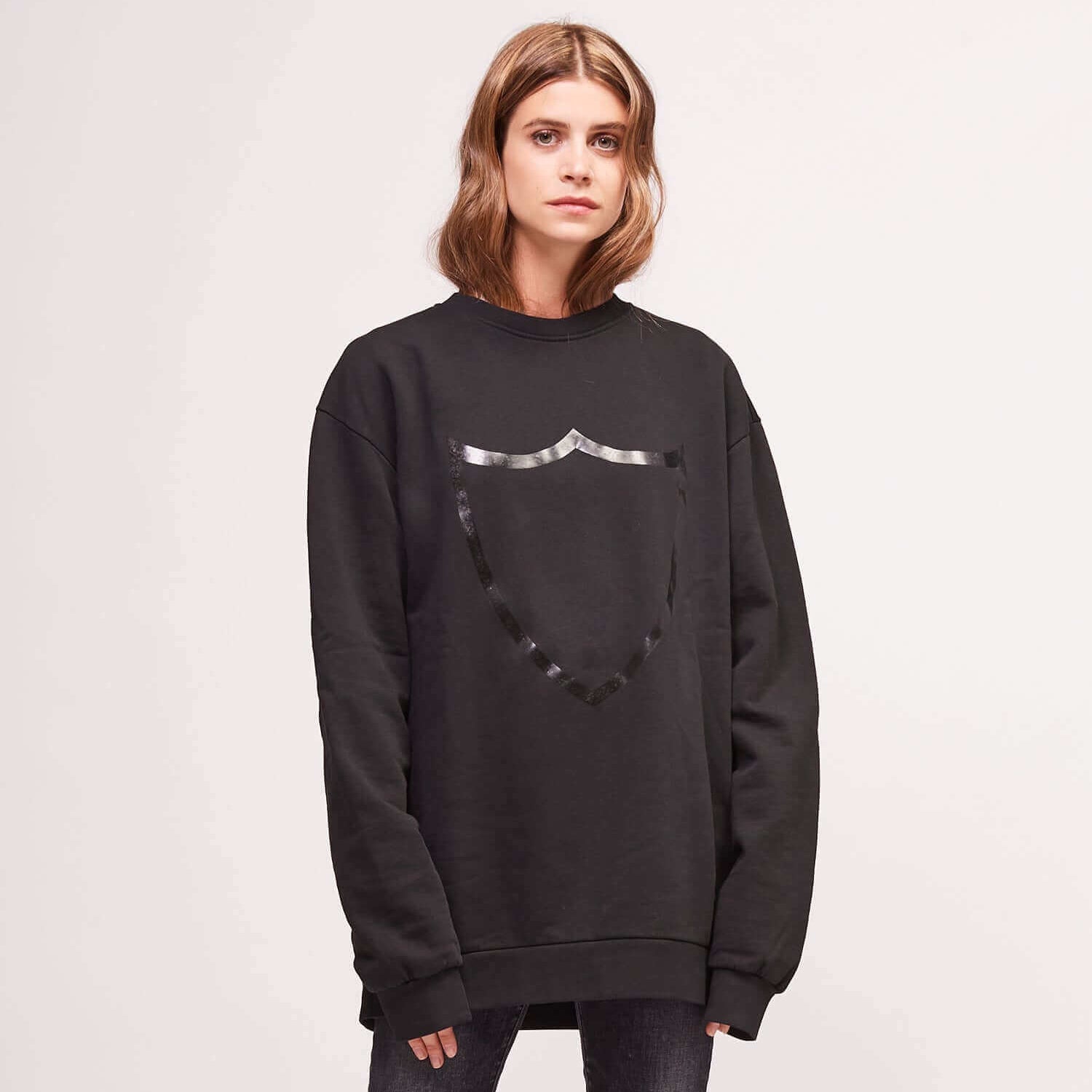 htclosangeles HTC LOGO SWEATER HTC LOGO SWEATER Crew neck black sweater with frontal logo. Elastic ribbed wrist bands and waist band. 100% cotton. Made in Italy. Hollywood Trading Company Hollywood Trading Company