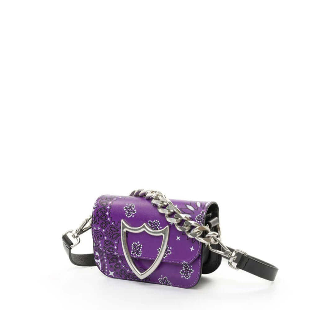 Hollywood Trading Company L.A. BANDANA MICRO BAG L.A. BANDANA MICRO BAG Leather micro bag. All over printed paisley bandana. Front flap with snap button closure. Front silver colored metal logo detail. One internal patch pocket. Leather lining. Leather sh