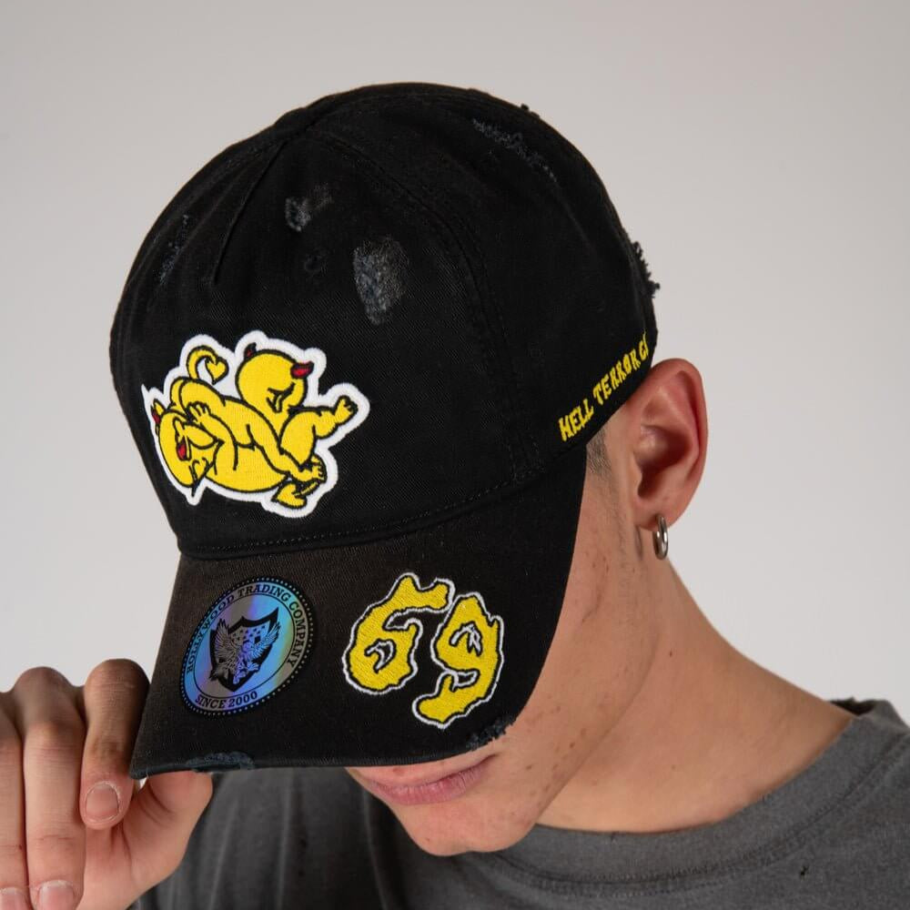 Hollywood Trading Company LIL DEVILS CAP LIL DEVILS CAP Baseball cap with preformed peak, round crown with eyelets, Htc devils on the front, adjustable strap on the back. One size fits all. 100% cotton. Hollywood Trading Company Hollywood Trading Company