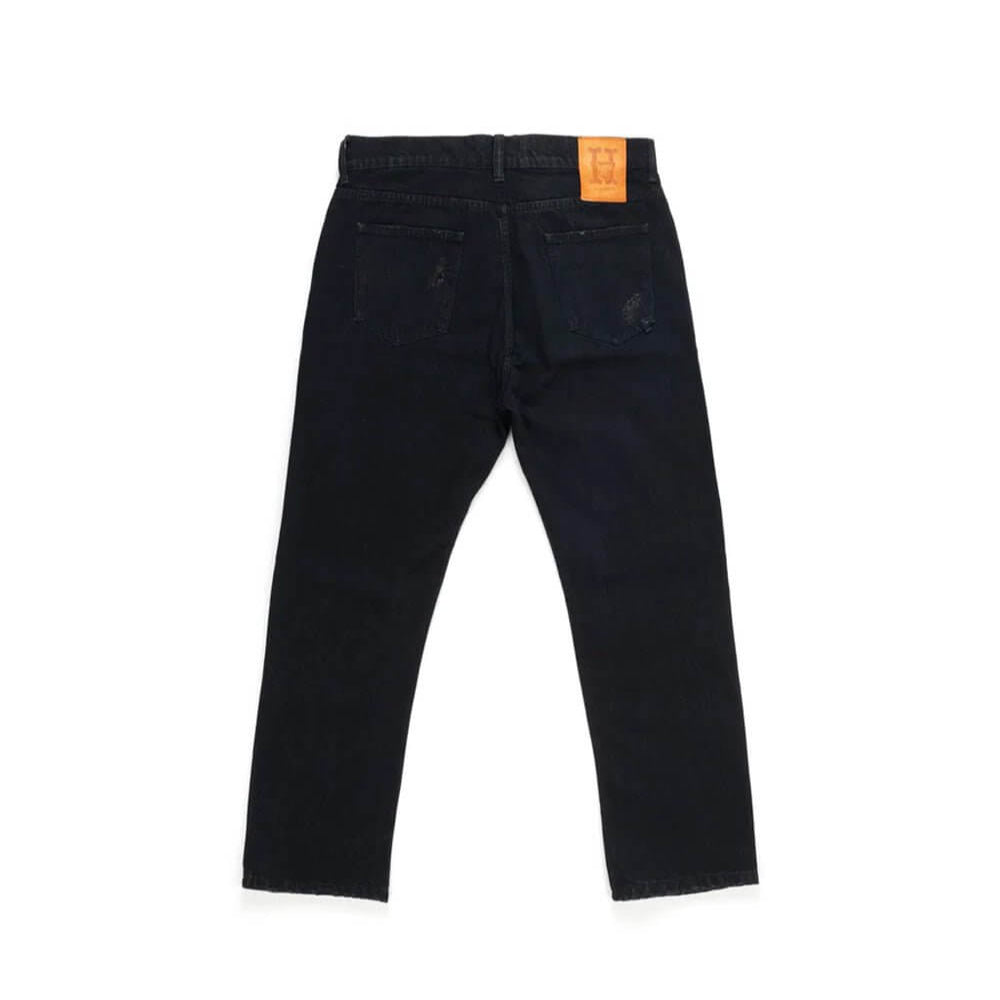 Hollywood Trading Company LOOSE LOOSE Loose fit jeans with front button and zip closure. Back leather logo patch. Intentionally distressed areas may vary. Five pockets. Hem: 17 cm. Composition: 100% Cotton PANTS Hollywood Trading Company Hollywood Trading