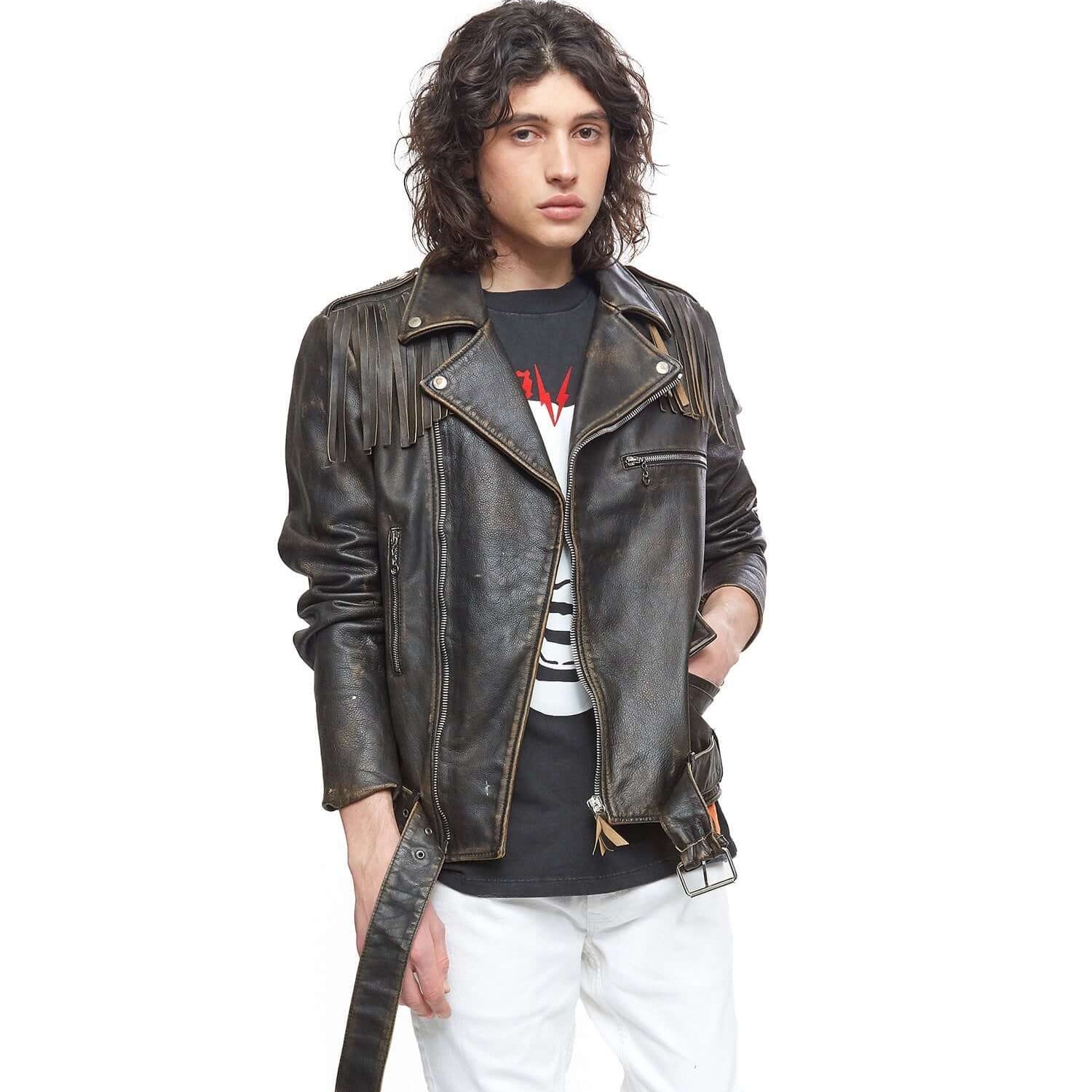 Hollywood Trading Company MICK JACKET MICK JACKET Black leather jacket. Asymmetric zip closure. removable fringes on the shoulders. Side pocket with zip closure. Zippers on the sleeves. 100% leather. Lining 100% viscose. Made in Italy. Hollywood Trading C