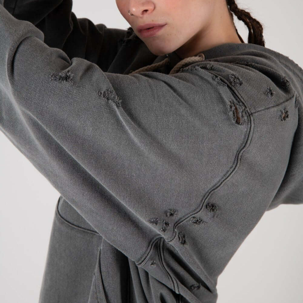 Hollywood Trading Company MY HOOD - DEVILS BLACK MY HOOD - DEVILS BLACK HTC devils' print distressed hoodie. Hood with drawstring, ribbed cuffs and hem. One front kangaroo pocket. Intentionally distressed areas may vary. Composition: 100% Cotton SWEATERS