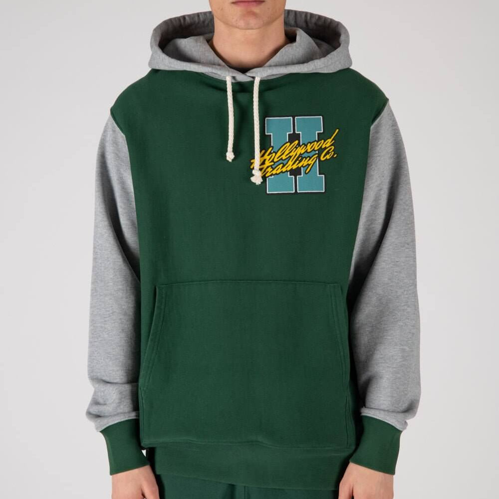 HTC LOS ANGELES MY HOOD - H MY HOOD - H Regular fit hoodie. Hood with drawstring, ribbed cuffs and hem. One front kangaroo pocket. H patch on the front. Composition: 100% Cotton sweater Hollywood Trading Company Hollywood Trading Company