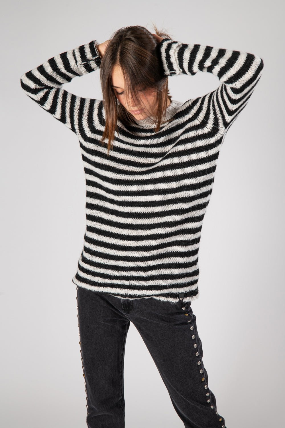 STRIPES KNIT SWEATER Striped knit round neck sweater. 42% Acrylic 30% Polyamide 14% Mohair 14% Wool HTC LOS ANGELES
