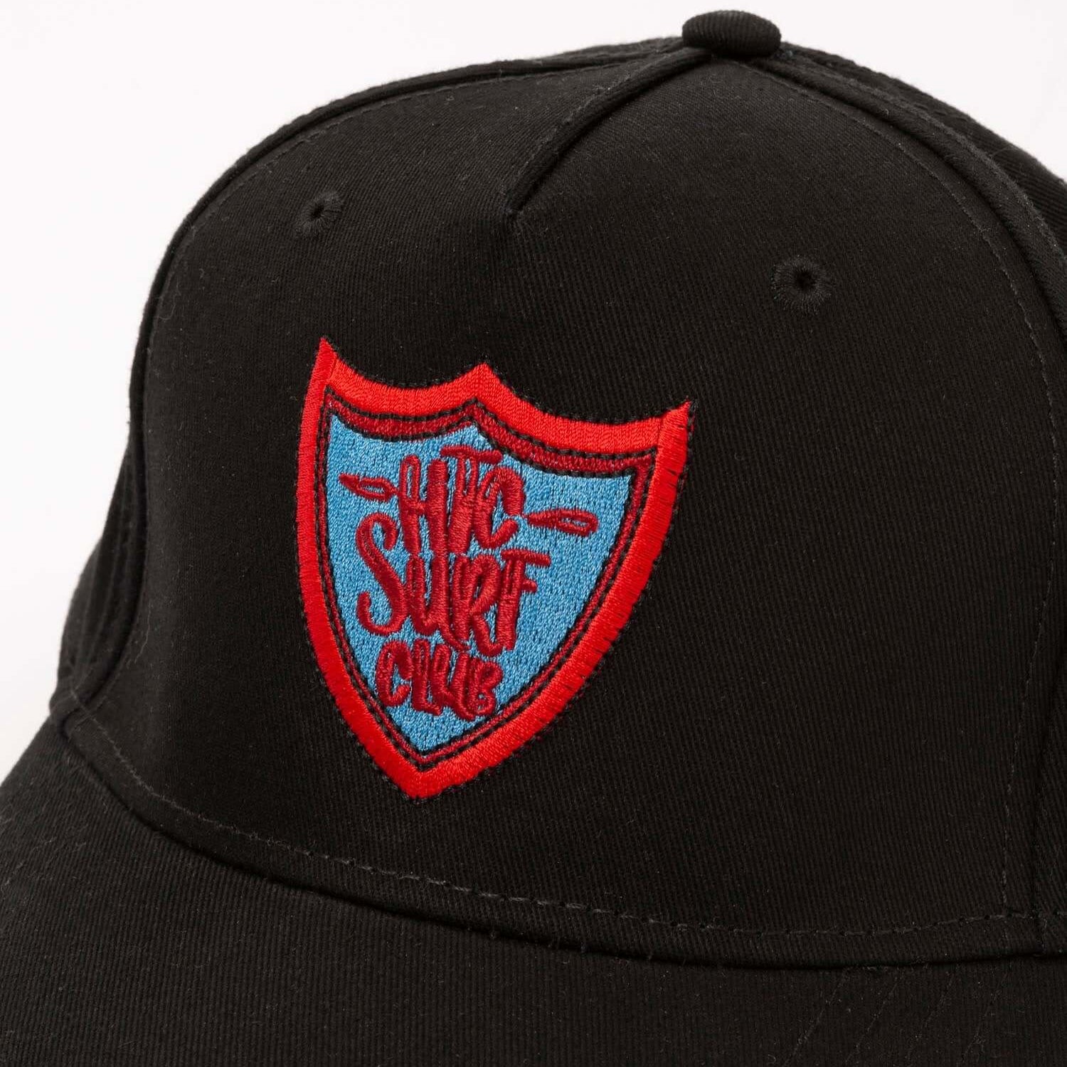 htclosangeles SURF CLUB CAP SURF CLUB CAP Limited Edition Black baseball cap with preformed peak, round crown with eyelets,'HTC SURF CLUB' logo printed on the front, adjustable strap on the back. One size fits all. 100% cotton. Hollywood Trading Company H
