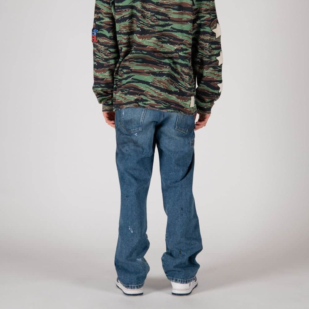Hollywood Trading Company WORKB**** WORKB**** Cargo jeans with front button and zip closure. Back leather logo patch. Stonewashed coloring may vary. Five pockets. Hem: 21 cm. Composition: 100% Cotton Hollywood Trading Company Hollywood Trading Company